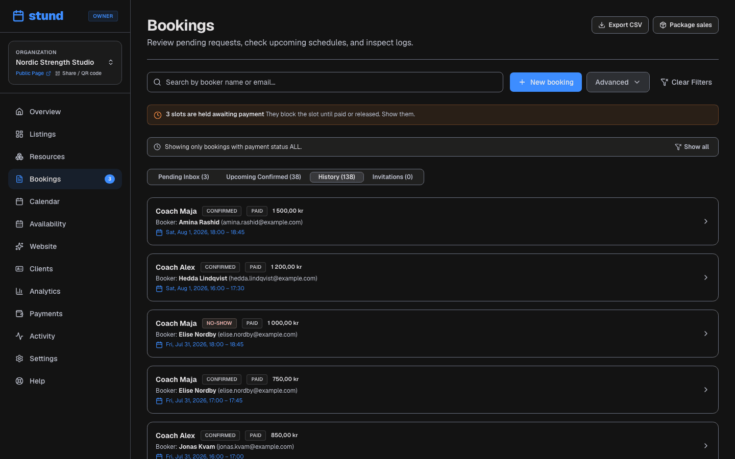 The History tab of the Bookings page, listing past bookings with their status and payment badges.