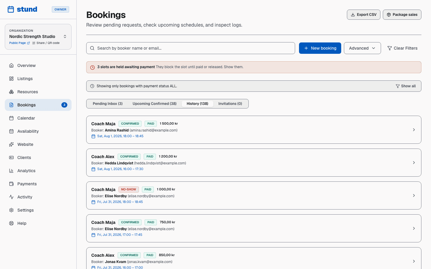 The History tab of the Bookings page, listing past bookings with their status and payment badges.